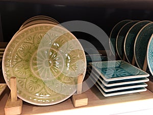 Ceramic plates on a shelf in a store