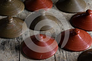 Ceramic pot lids for sale in Maragogipinho in the city of Aratuipe, Bahia photo