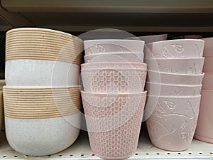 Ceramic pots for flowers on a shelf in a store