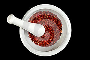 Ceramic pounder with paprika photo