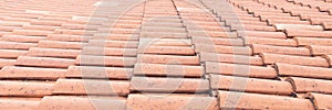 Ceramic roof tile background texture roofing red corrugated tiles element seamless pattern in web header panoramic