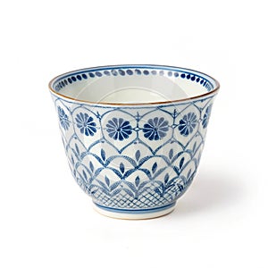 Ceramic sake cup with blue pattern isolated on white background