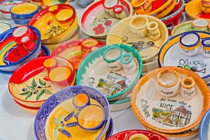 Ceramic souvenir pottery dishes at the Cours Saleya famous market in Nice France photo