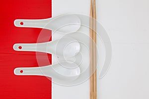 Ceramic spoons and bamboo chopsticks for sushi food