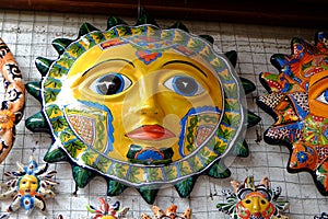 Ceramic Sun Faces on display in La Tienda at Puerto Penasco Mexico