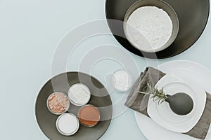 Ceramic tableware with baking ingredientes. top view on pastel background mock up.