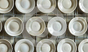 Ceramic tableware, top view of empty bowls and saucers