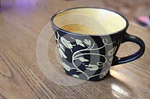 ceramic tea pot with a picture of flowers