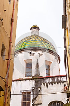 Ceramic tile covered dome of a church at Via Tribunali in Naples, Italy photo