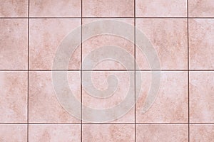 Ceramic tile floor texture, stone wall background. Square pattern, smooth brown marble in the kitchen, bathroom. Abstract grunge