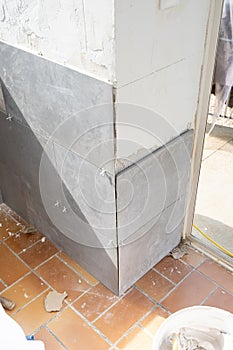 Ceramic tile installation site with its tools