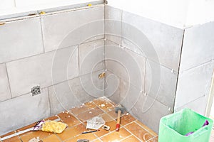 Ceramic tile installation site with its tools