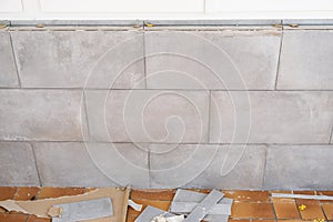 Ceramic tile installation site with its tools