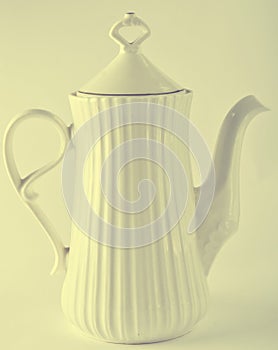 Ceramic white teapot on white background