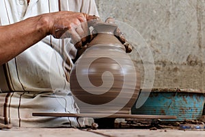 Ceramist working in a piece