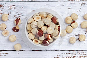 A bowl with shelled hazel nuts