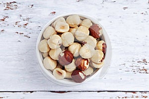 A bowl with shelled hazel nuts