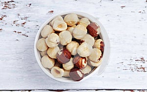 A bowl with shelled hazel nuts