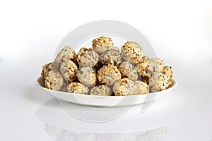 Cereal balloons with poppy seeds and sesame seeds on a plate healthy food