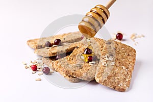 Cereal Bars with Oatmeal Chocolate Berry and Honey Tasty Cookies White Background Close Up