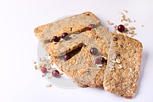 Cereal Bars with Oatmeal Chocolate Berry and Honey Tasty Cookies White Background Close Up Copy Space