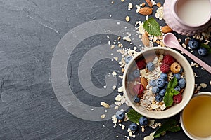 Cereal breakfast with fresh berries and milk