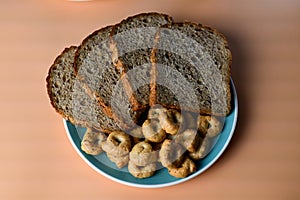 cereal dietary bread with round croutons, on blue background