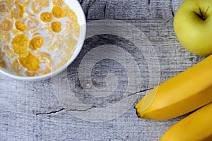 Cereal and fruit for Breakfast on the table. Delicious food at h