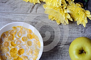 Cereal and fruit for Breakfast on the table. Delicious food at h