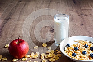 Cereal and fruit for Breakfast on the table. Delicious food at h