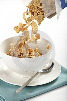 Cereal pouring into bowl