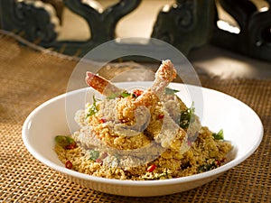 Cereal Prawns served in a dish isolated on table side view