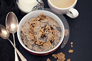 Cereals with chocolate cereals in red bowl