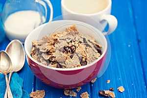 Cereals with chocolate cereals in red bowl