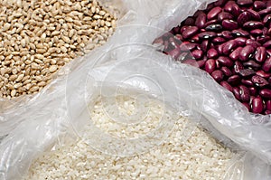 Cereals for cooking. Healthy food concept. Rice, pearl barley and beans, close-up