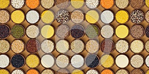 Cereals, grains and flakes in wooden bowls. Seamless pattern. Top view