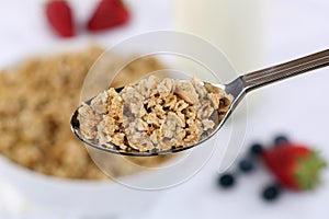 Cereals on spoon for breakfast