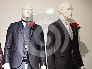 Ceremonial groom suits or business suits on display blue and black