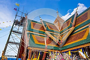 The ceremony of mounting the gable-finial at Phrathat San Don temple