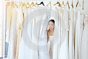 Ceremony in wedding day,Happy and smiling,Portrait of beautiful asian woman bride in white dress cheerful and funny