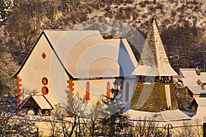 Cerin church during winter evening after snowfall