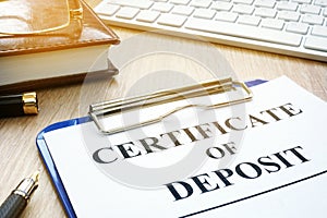 Certificate of deposit on a desk.