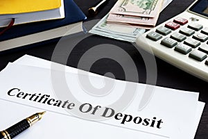 Certificate of deposit and pen in the office