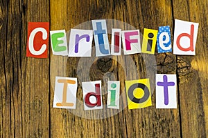 Certified idiot joke dumb ass  nincompoop arrogant moron photo