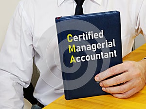 Certified Managerial Accountant CMA is shown using the text photo