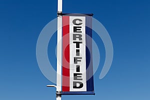 Certified Pre-Owned Vehicle sign at a used car dealership III