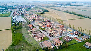 Certosa of Pavia, aerial view, village. Roofs and fields in the province of Pavia. Pavia, Lombardy, Italy