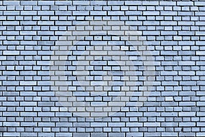 Cerulean blue colored brick wall background photo