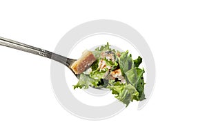 Cesar salad in a fork
