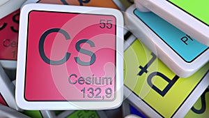 Cesium Cs block on the pile of periodic table of the chemical elements blocks. 3D rendering